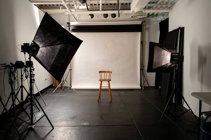 Photographer creating a professional portrait