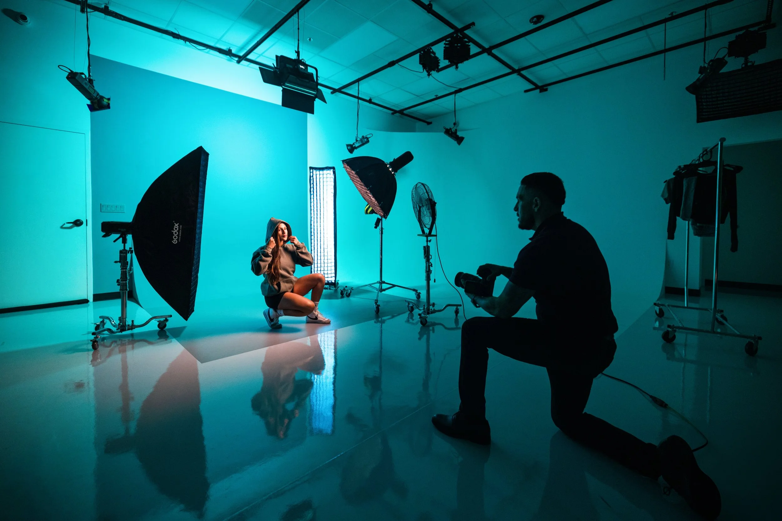 Photographer directing a professional studio session